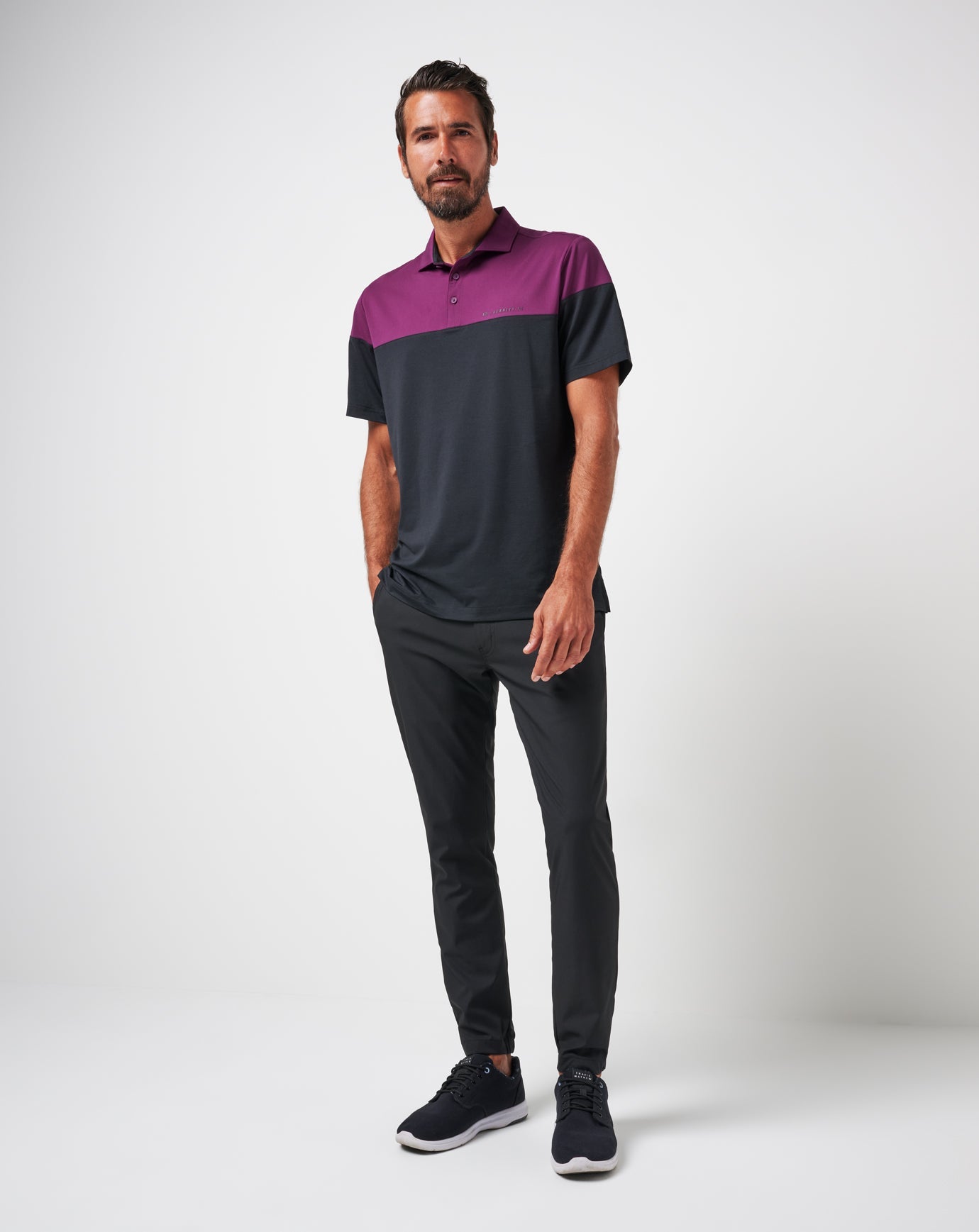 TravisMathew Burnley Pushback Polo - Black