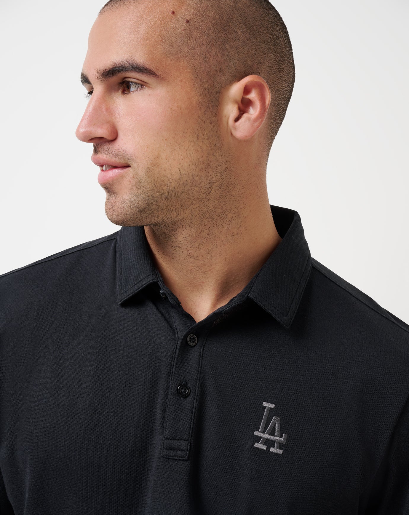 TravisMathew Los Angeles Dodgers Playoff Pitch Polo - Black