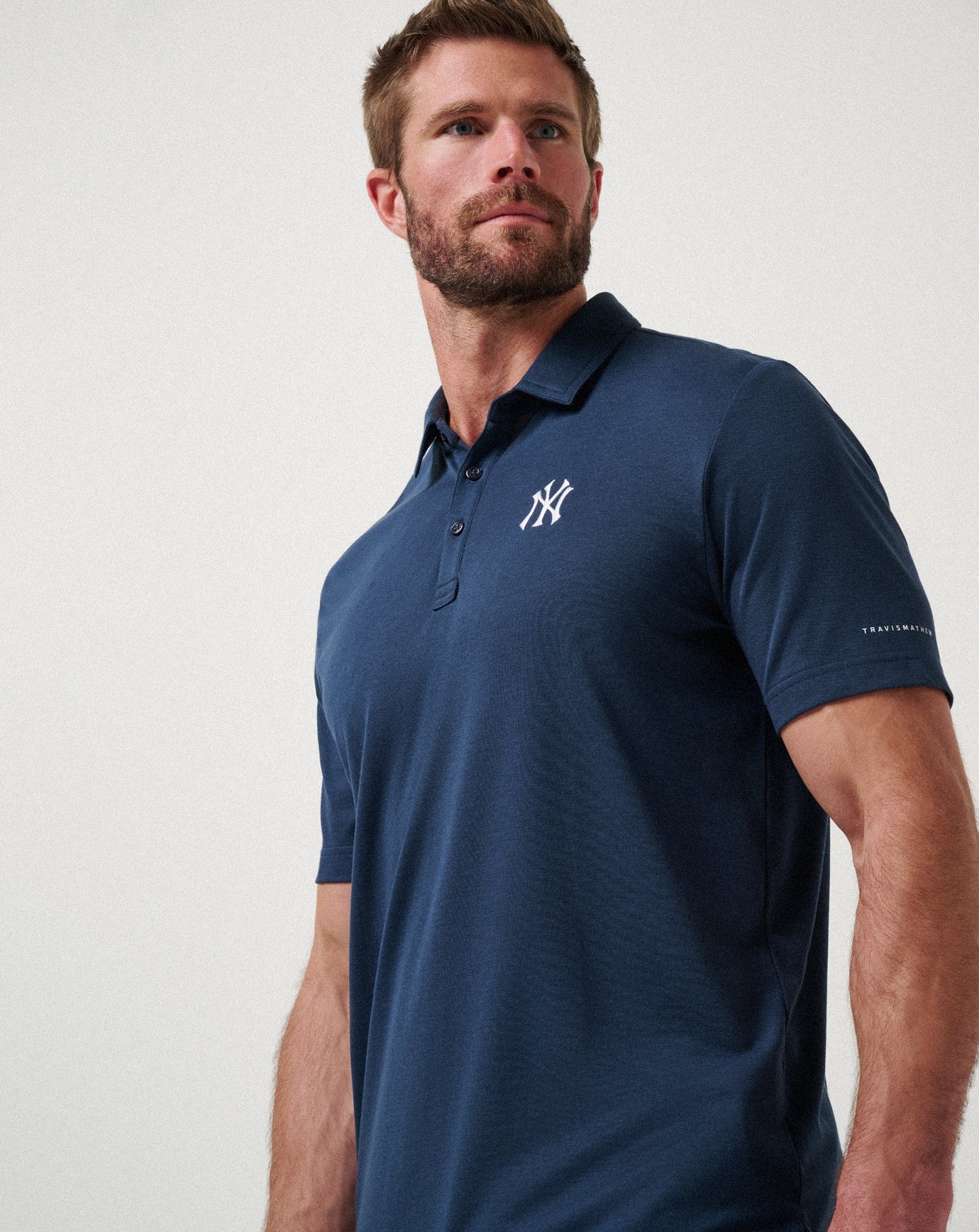 TravisMathew New York Yankees Playoff Pitch Polo - Navy