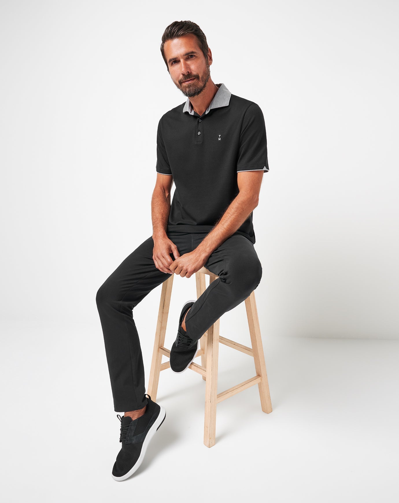TravisMathew Reservation Number Polo - Black