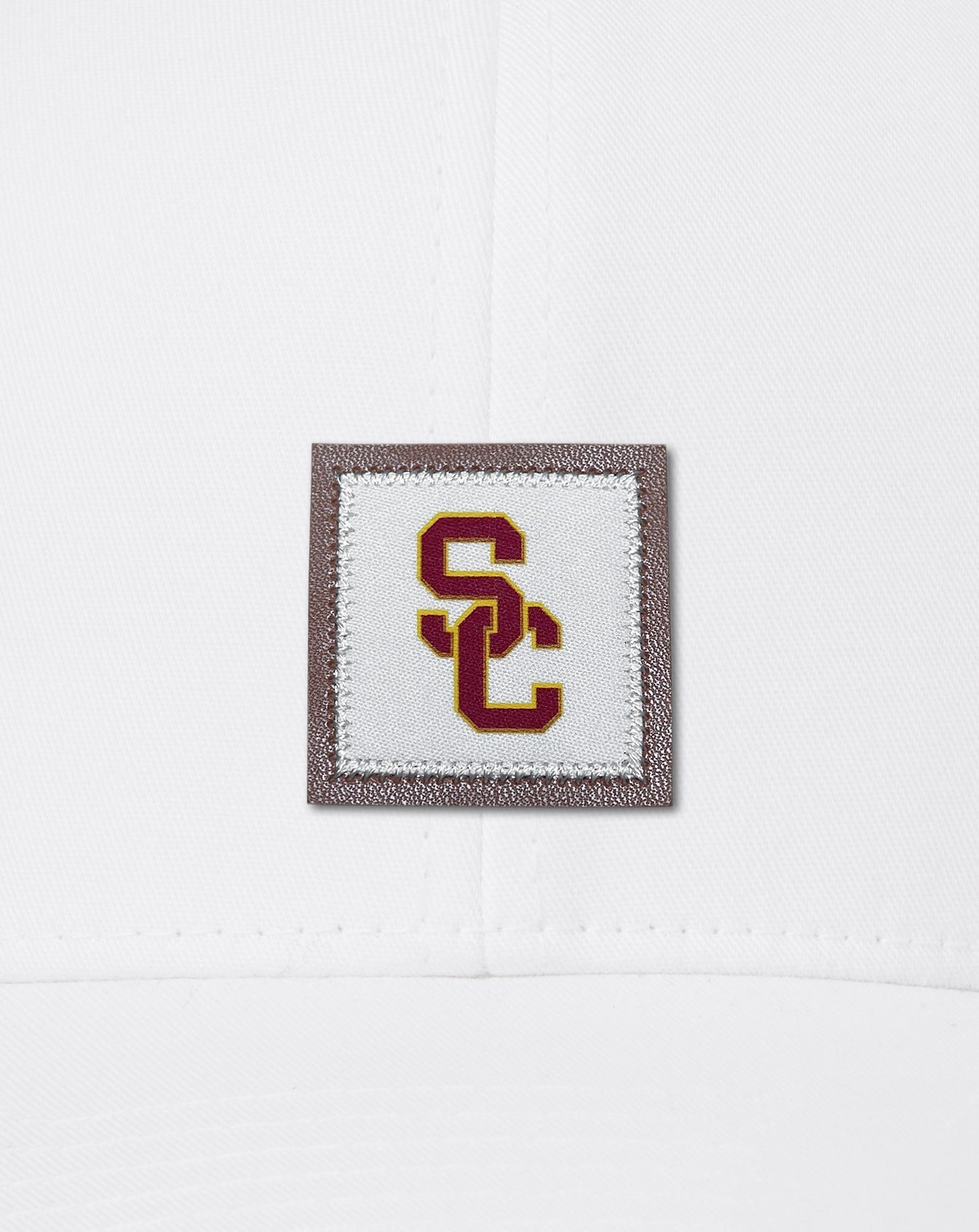 TravisMathew USC Leather Patch Snapback Hat - White