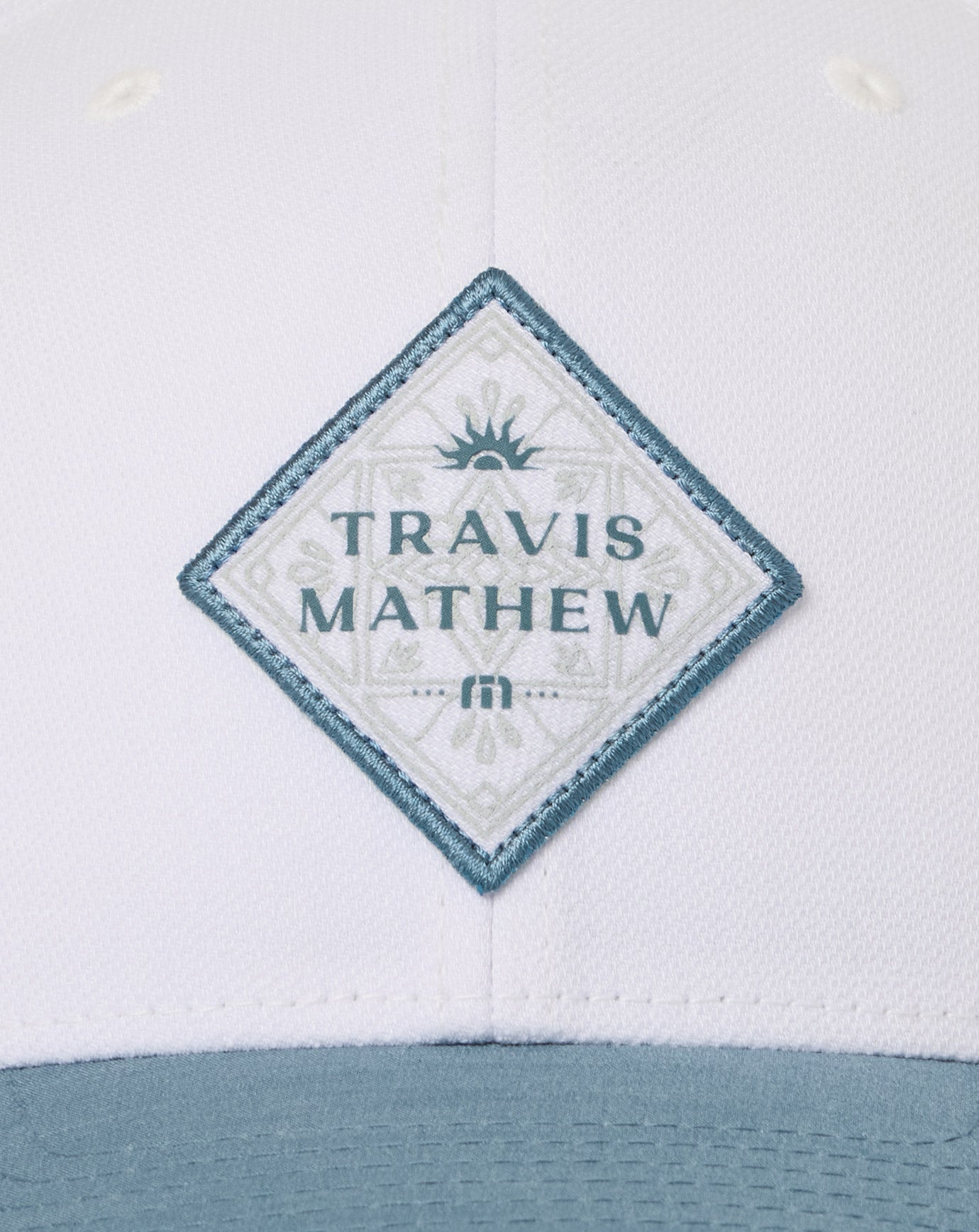 TravisMathew Base Fare Snapback Hat - White