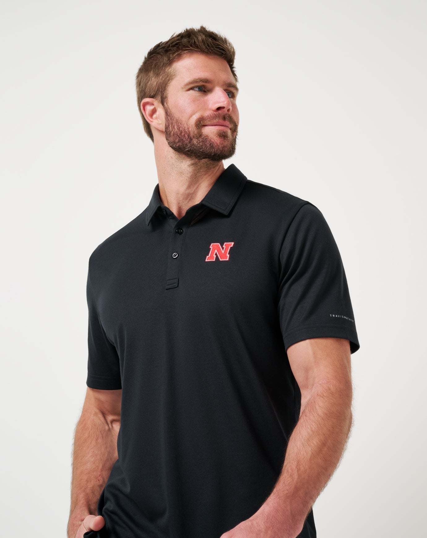 TravisMathew Nebraska School Pride Polo - Black