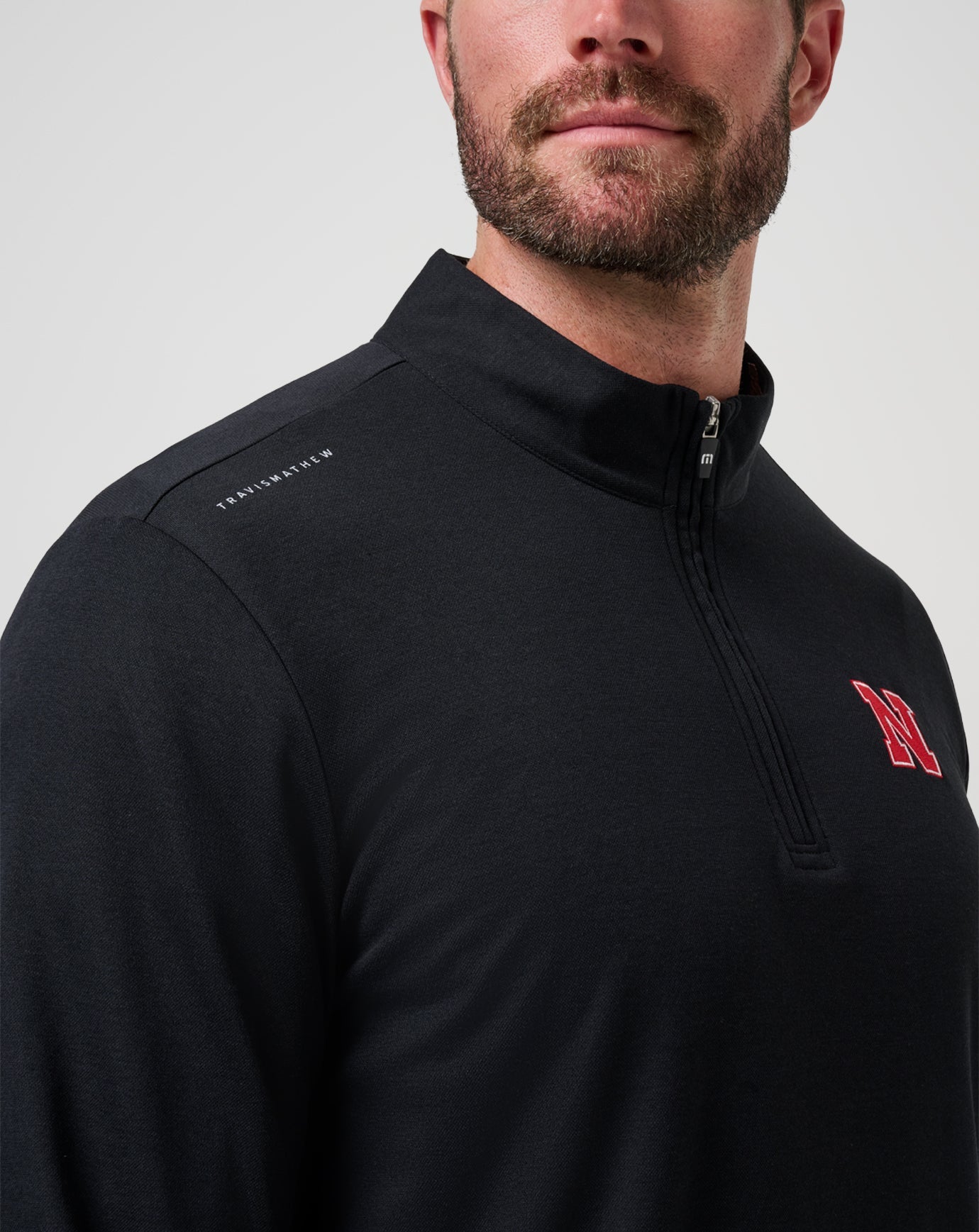 TravisMathew Nebraska Time To Tailgate Quarter Zip - Black