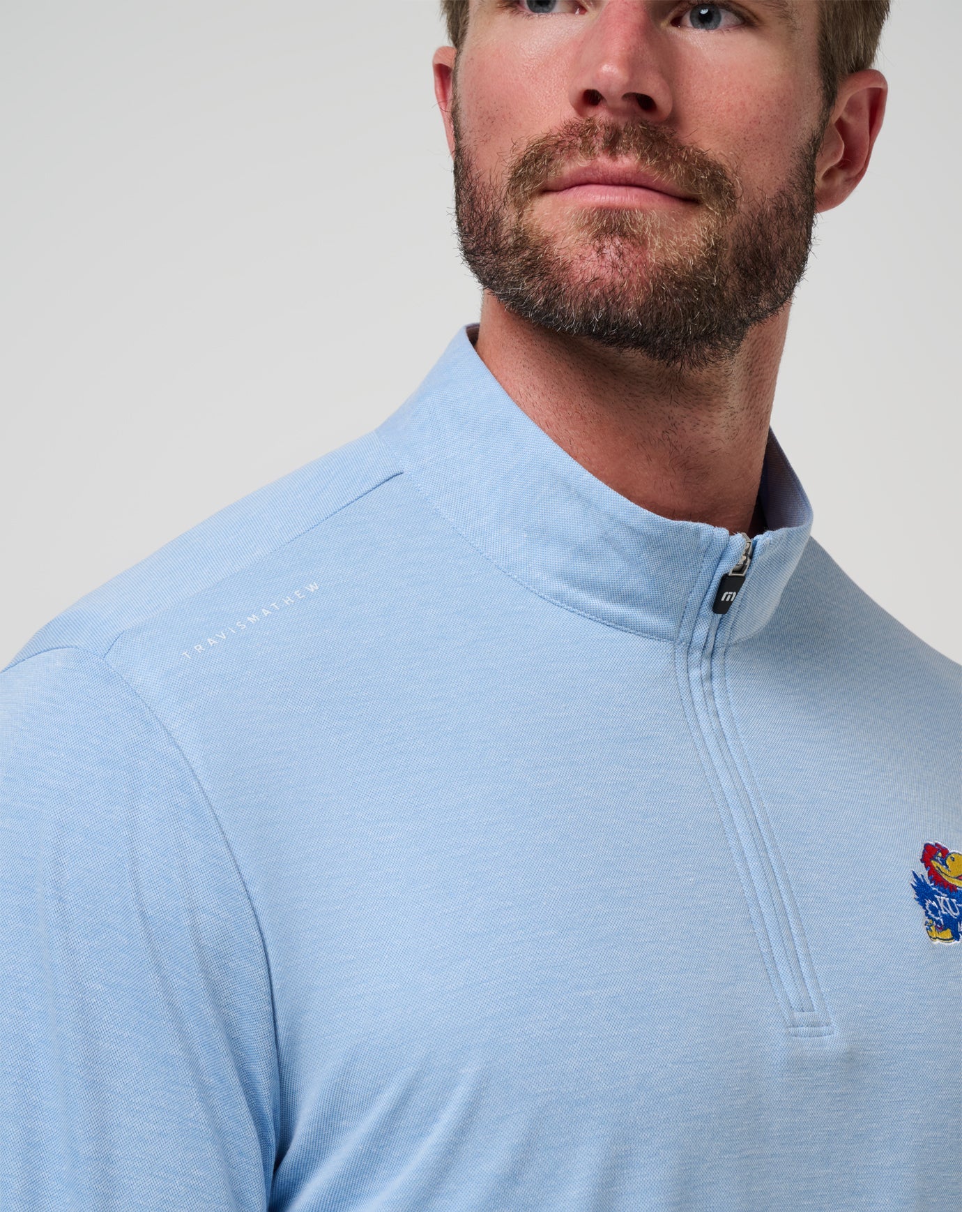TravisMathew Kansas Time To Tailgate Quarter Zip - Heather Blue